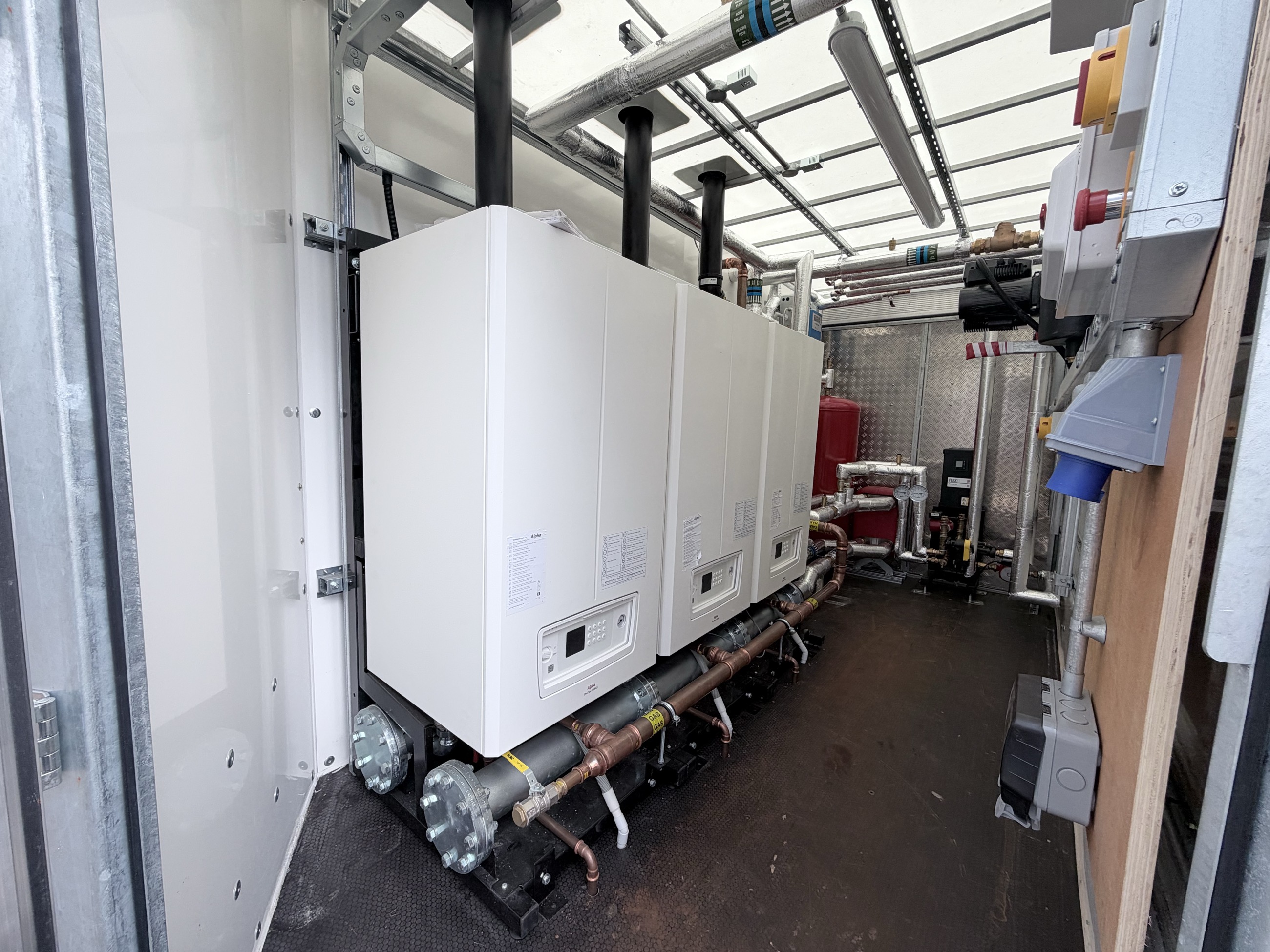 Bank of commercial boilers mounted inside a Stack trailer
